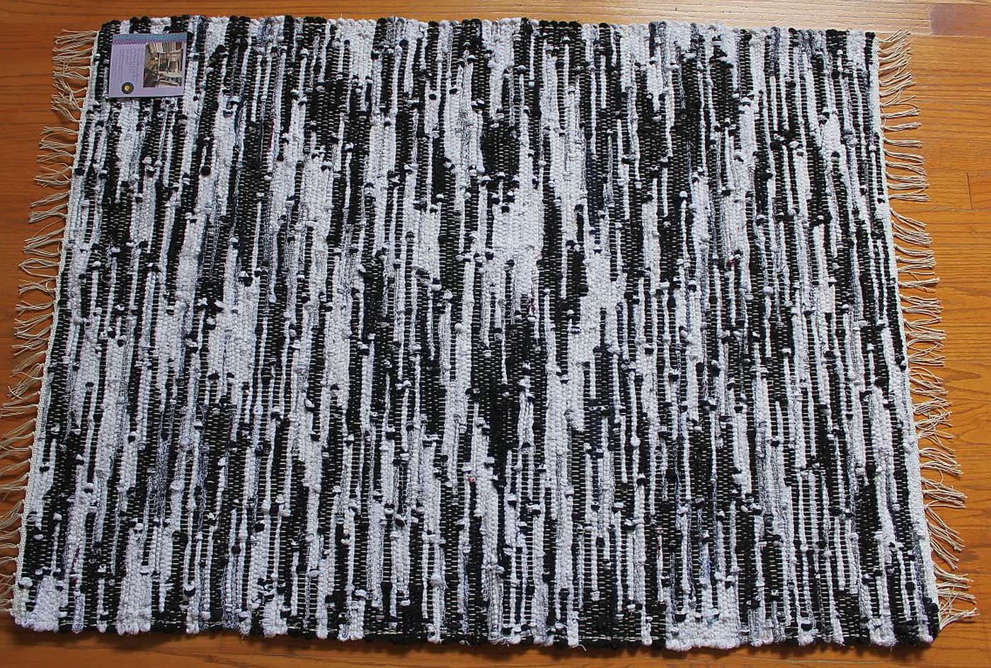 Black and white woven rag rug